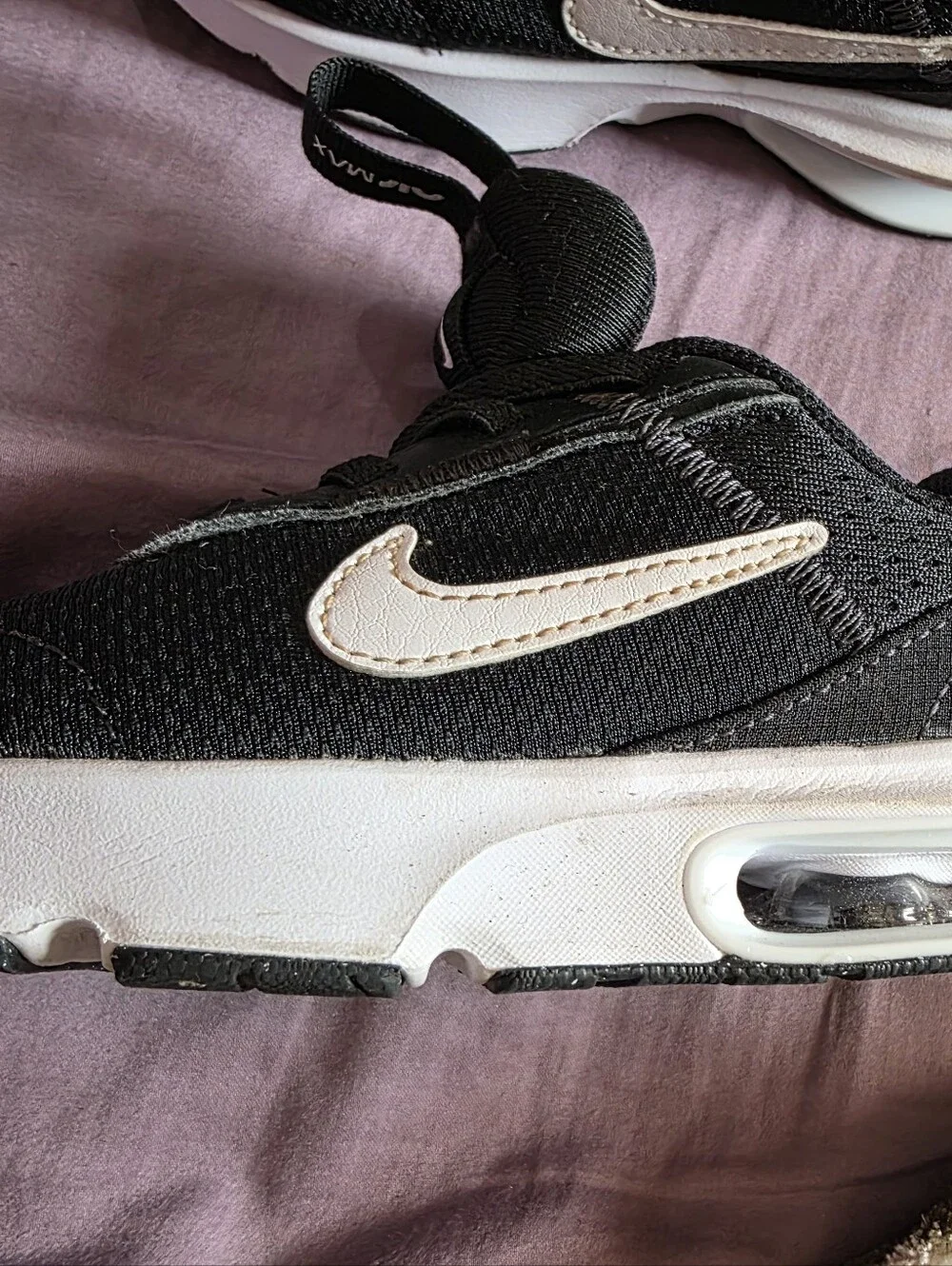 Nike Kids Black Sneakers with White Sole and Small Pink Swoosh